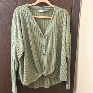 Button sweater with detailed twist